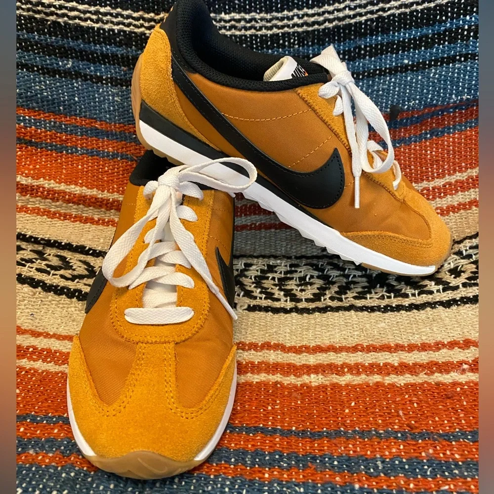 The Nike Pacific Sneaker in Monarch Orange and black swoosh. Only worn twice - Picture 2 of 4